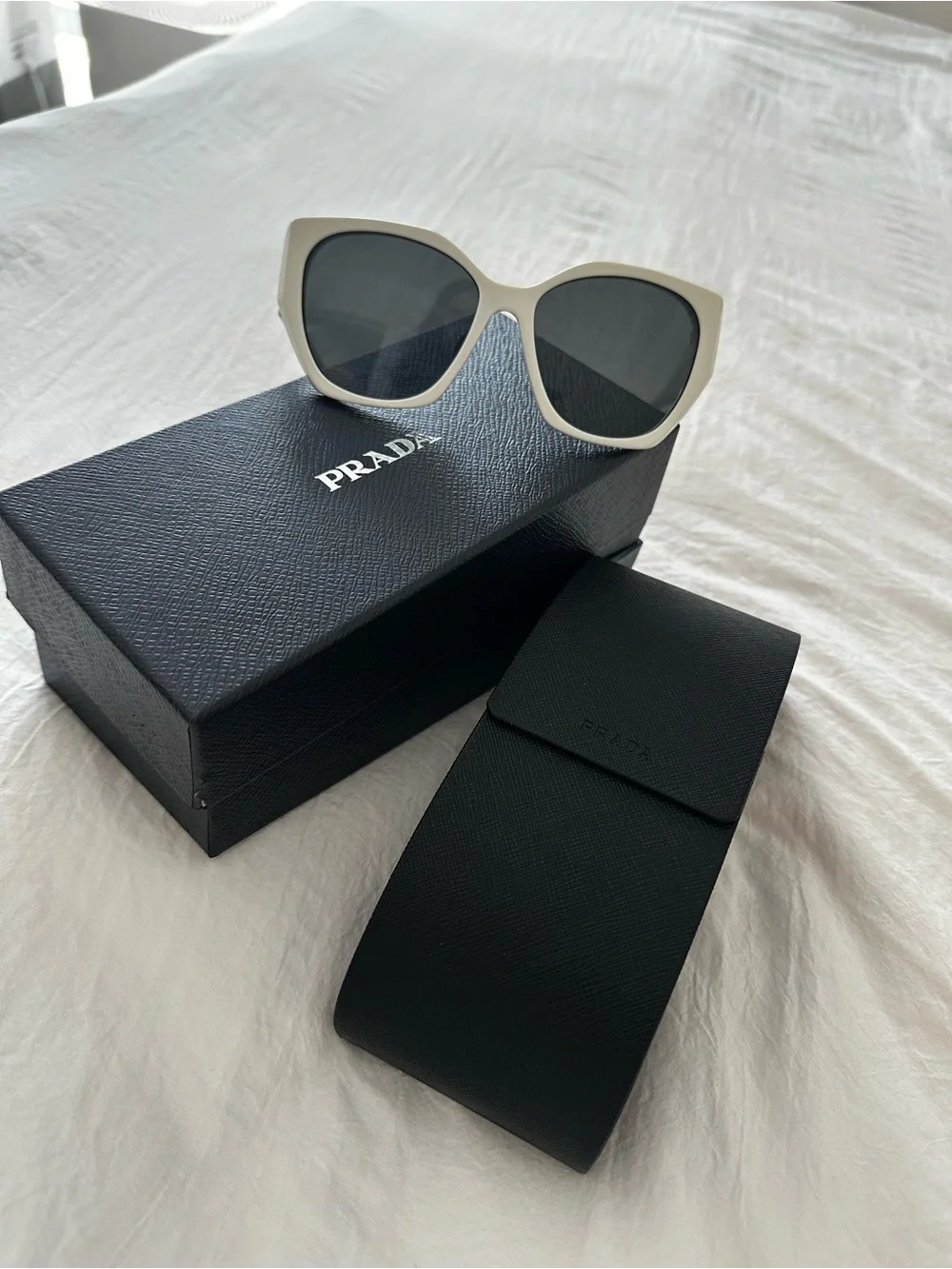 Prada White Oversized Cat-Eye Sunglasses with Dark Lenses